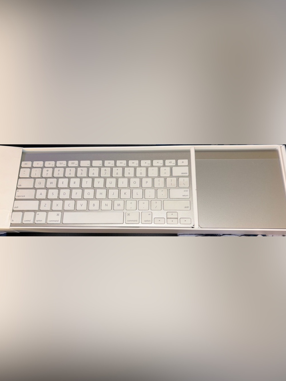 Apple White and Silver Wireless Keyboard and Trackpad